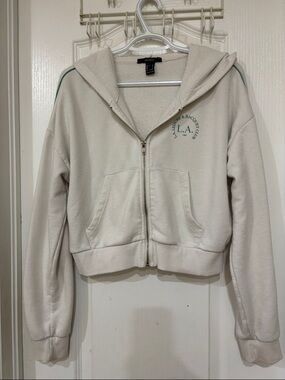 Cropped Cream Zip-Up Hoodie with Green Logo